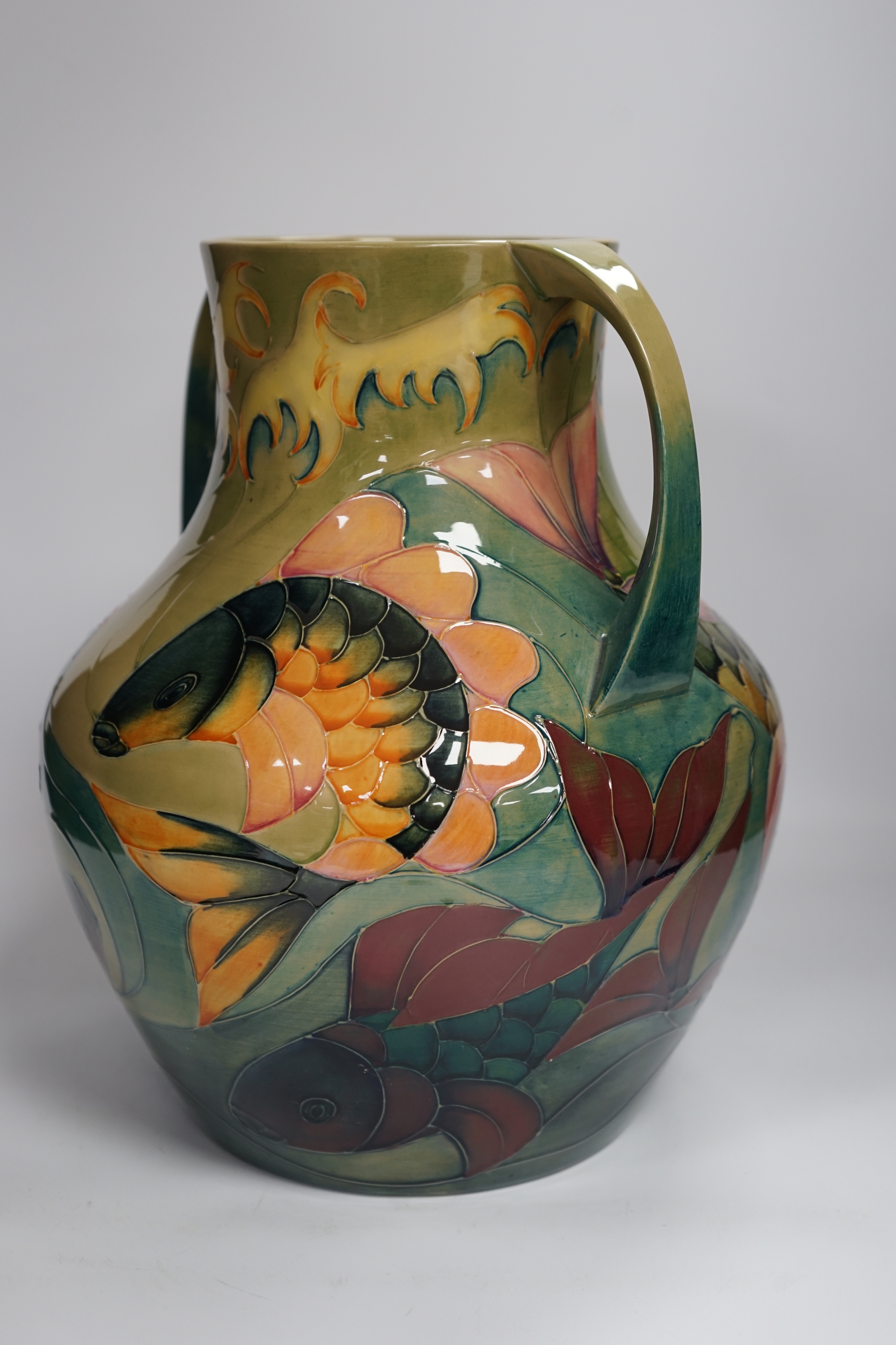 A large Moorcroft twin-handled 'carp' vase, designed by Sally Tuffin, 33cm high